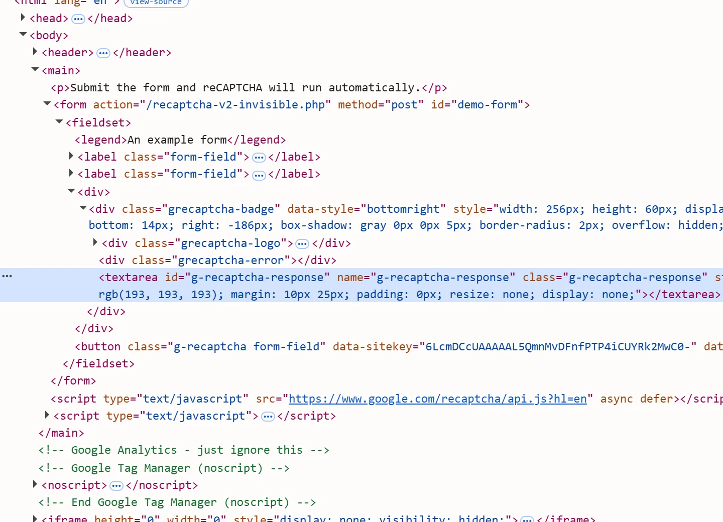 The hidden g-recaptcha-response textarea selected inside a form in the Elements panel