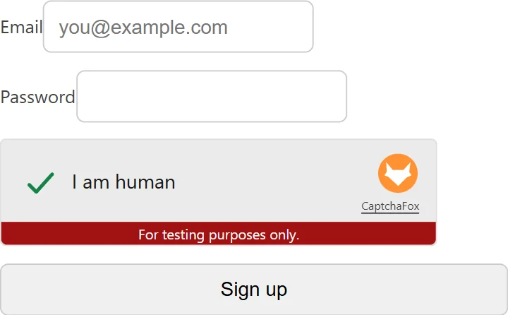 The CaptchaFox widget inside a local demo signup form using the documented test sitekey, the widget checkbox shown in its checked state with the form fields around it